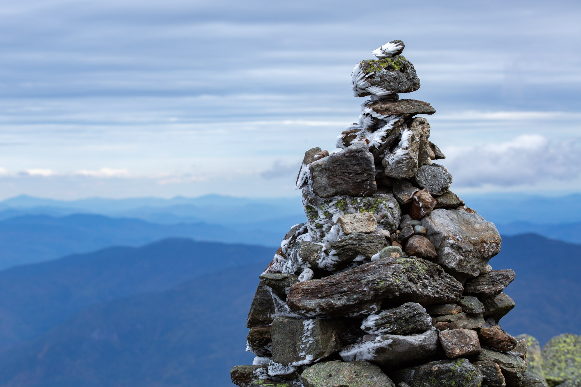 Cairn covered in ice atop Mt Washington