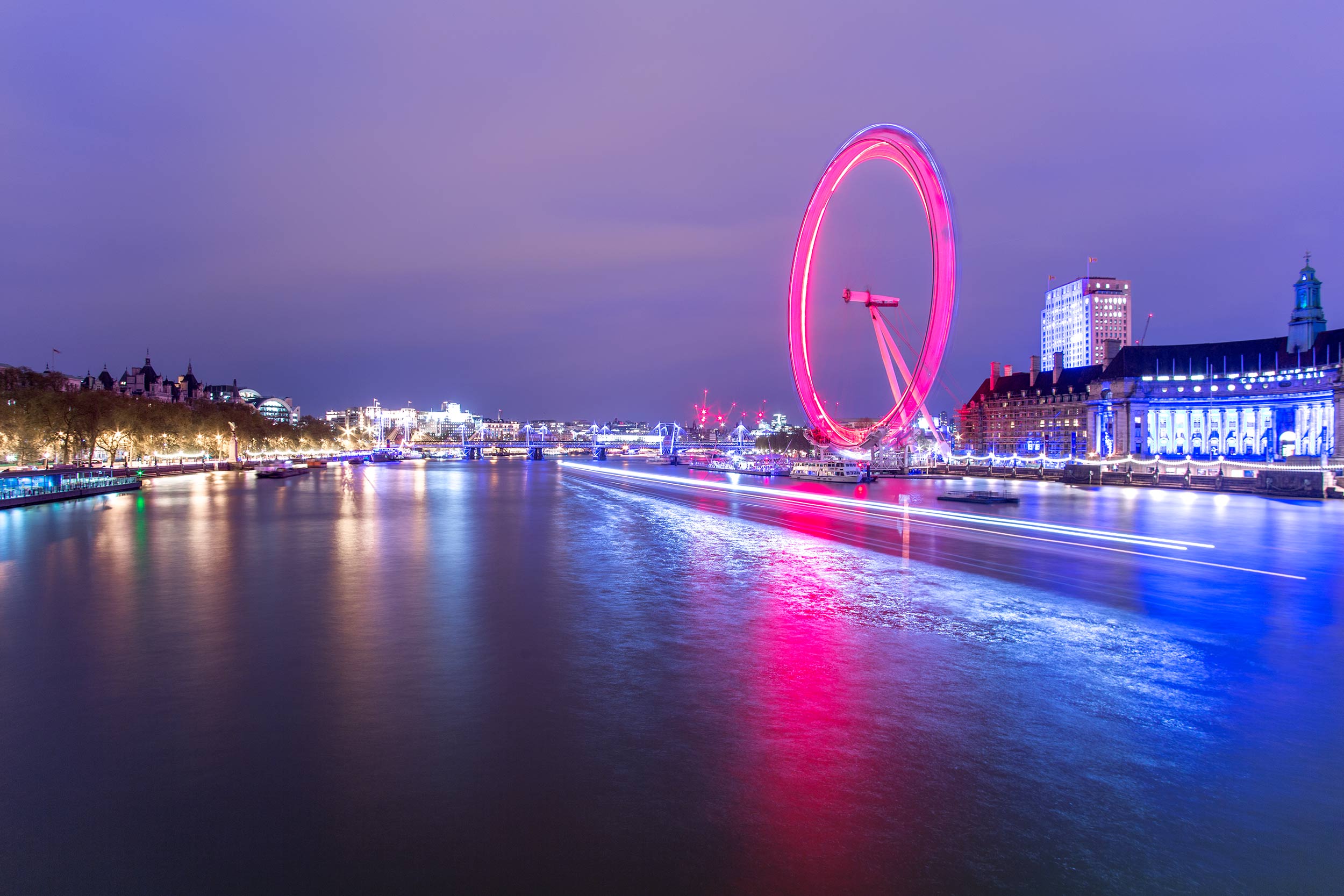 The London Eye reflecting over the River Thames