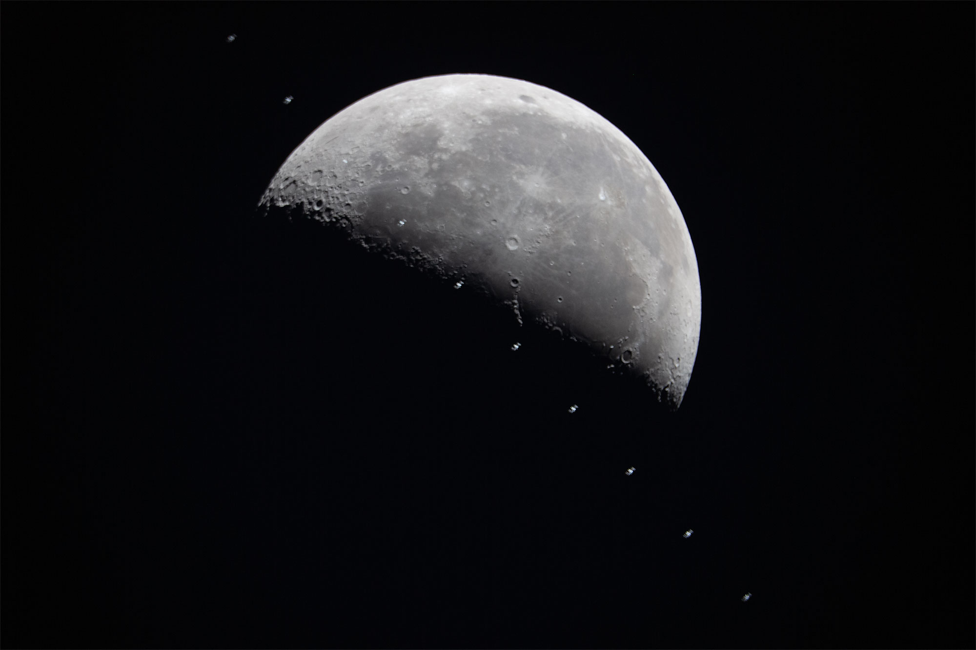 10 frame stack of the ISS lunar transit